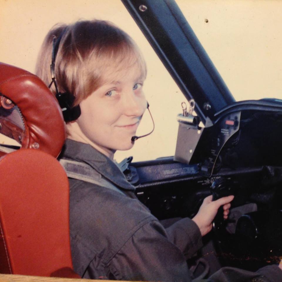 Bell, piloting a P-3C aircraft sometime in 1990.