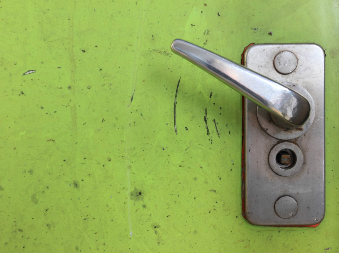 A door stuck shut by wedging pennies in the jamb